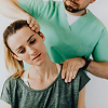 therapist-treating-a-female-patient
